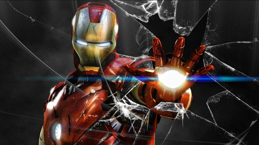 Smashingly Creative: Iron Man's Handbreaks Through Cracked Computer Screen Wallpaper