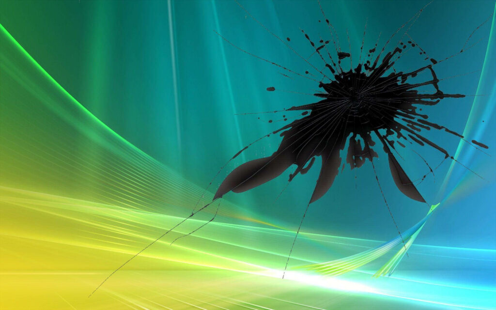 Broken View: Cracked Computer Screen and Black Smudge Wallpaper on Vista Desktop