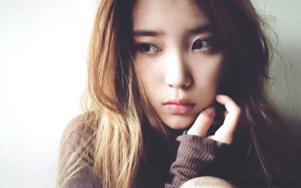 Melancholic Moods: IU's Sad-Faced Wallpaper