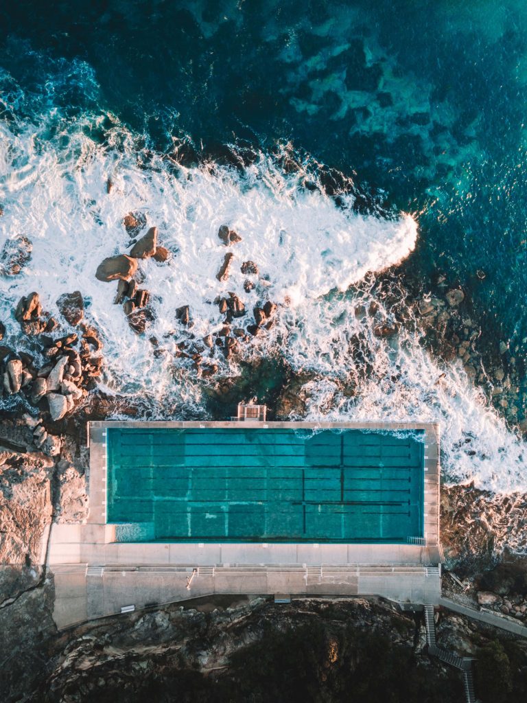 Aerial view of Bronte Baths Sydney turquoise ocean pool waves coastal sunset rocks wallpaper