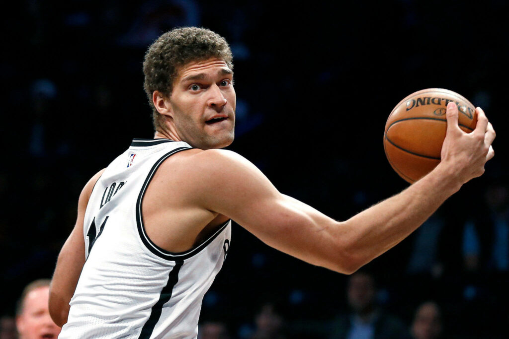 Brook Lopez Brooklyn Nets close-up action shot basketball intense focus vibrant colors wallpaper