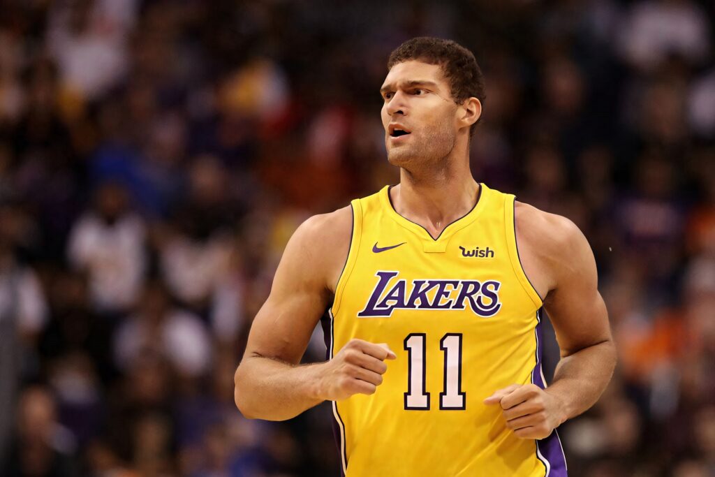 Brook Lopez Los Angeles Lakers yellow jersey 11 intense game focus basketball arena wallpaper