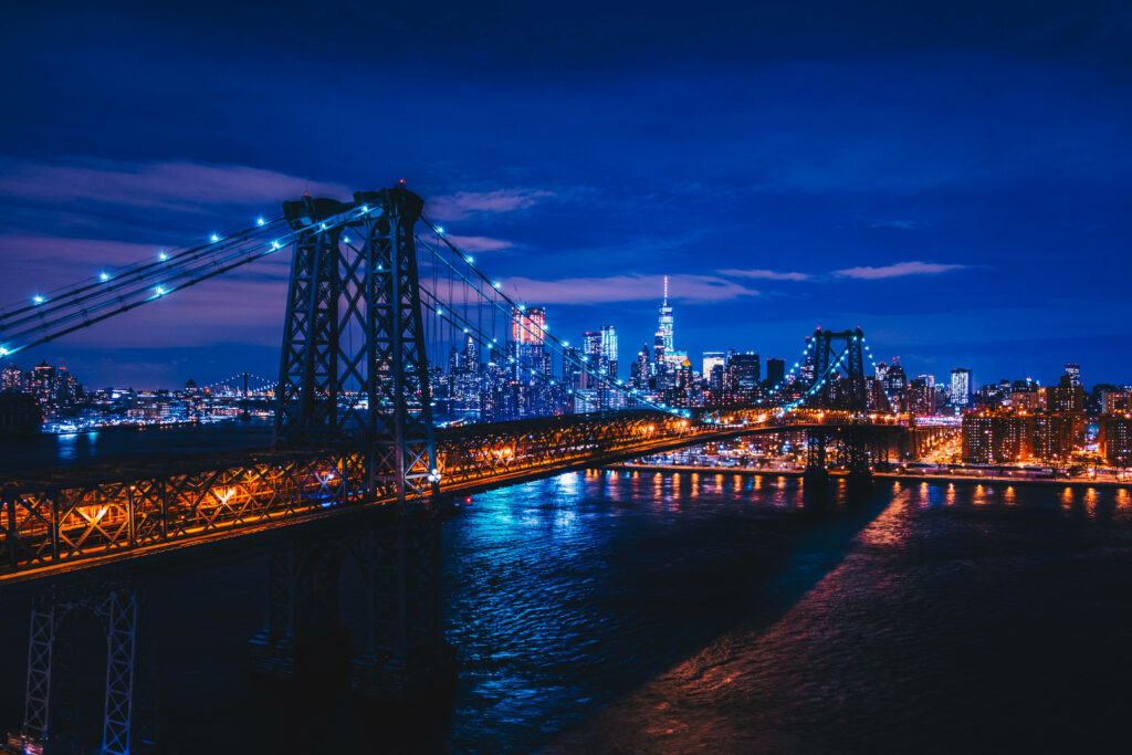 Stunning Brooklyn Bridge Night Wallpaper with City Skyline Reflection