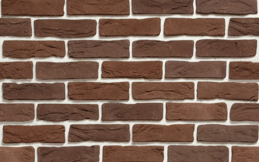 Elegant Earthy Hues: A Captivating Brickscape in High-Definition Wallpaper