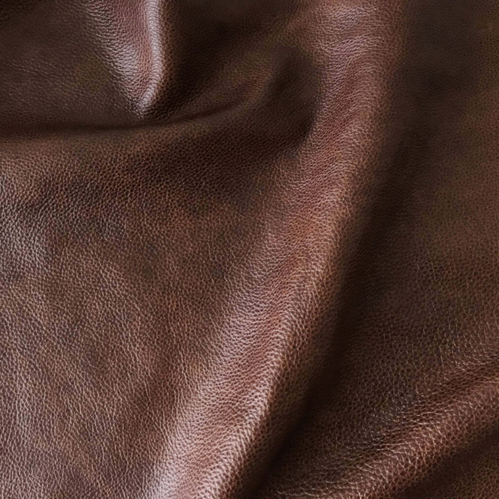 Close-Up Brown Leather Wallpaper: Rich Texture & Painted Effect