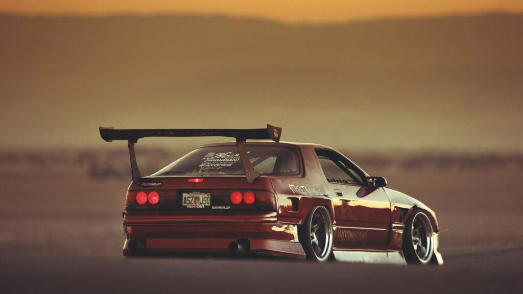 Sleek and Stylish: Captivating Brown Mazda RX7 JDM as a Striking HD Wallpaper Background