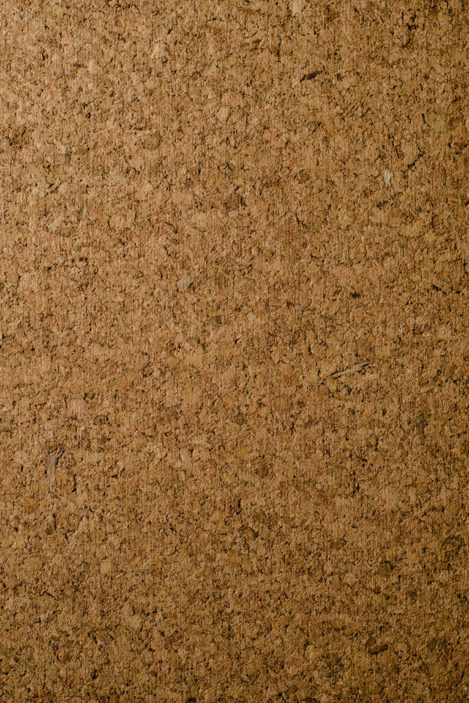 Brown Textured Corkboard Wallpaper: Natural Earthy Background