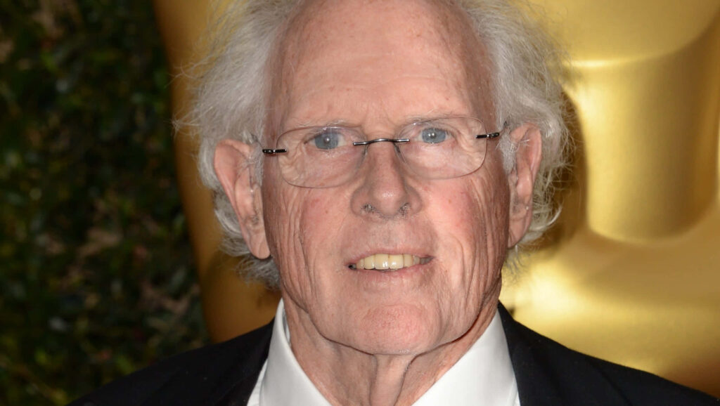 Bruce Dern close-up portrait formal attire golden background classic Hollywood actor wallpaper