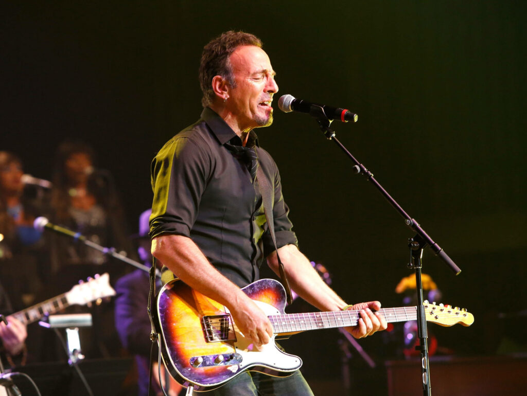 Bruce Springsteen passionately plays electric guitar on vibrant stage at Dr Johns tribute concert Wallpaper