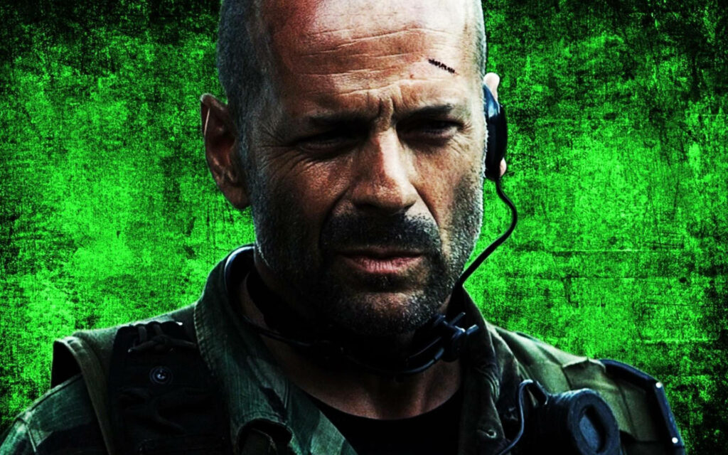 Bruce Willis as Lt Waters in military gear with headset stands alert green textured background Wallpaper