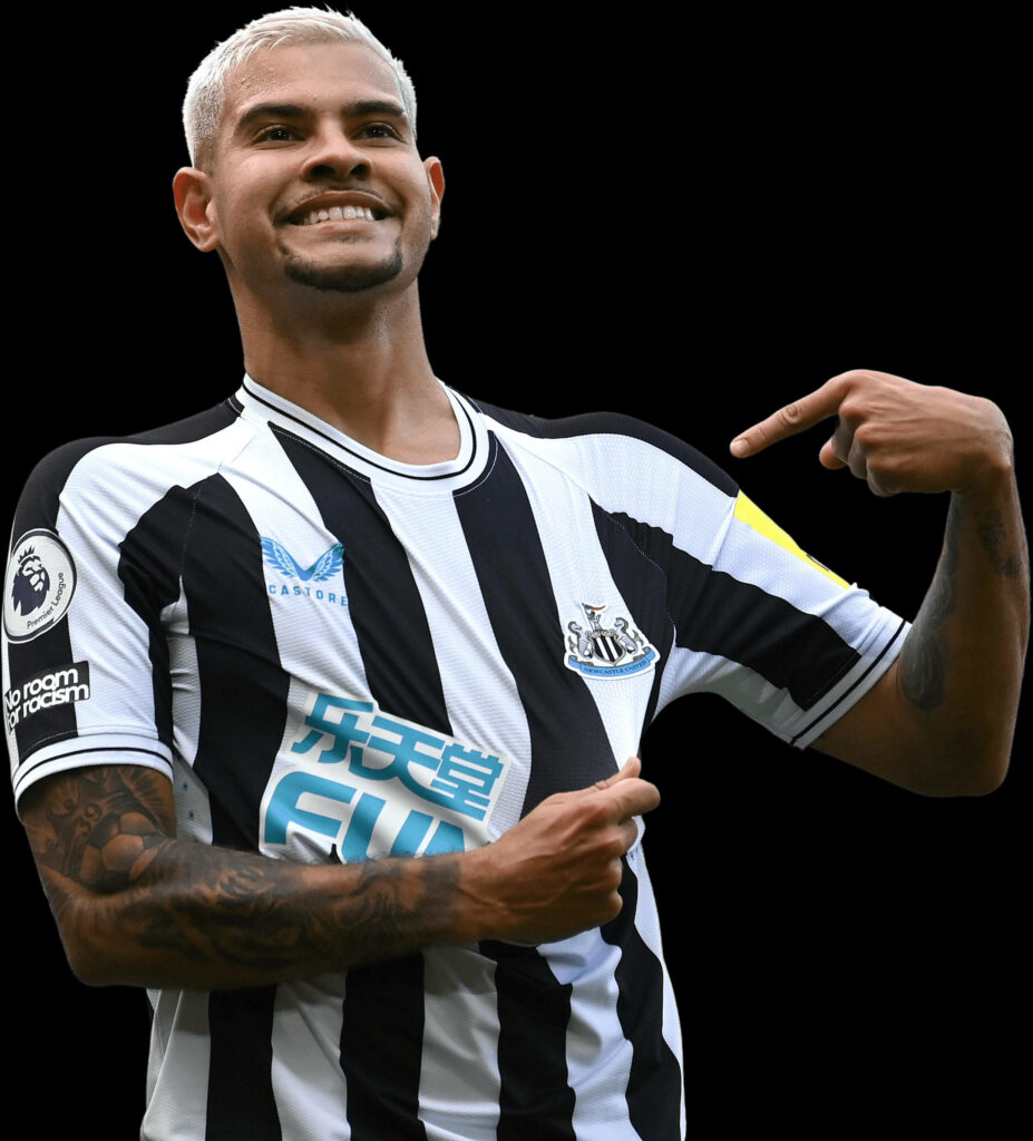 Bruno Guimarães smiling in Newcastle United jersey pointing team badge high-resolution wallpaper