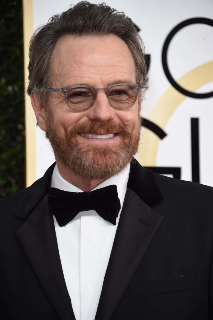 Bryan Cranston in black tuxedo and glasses at awards ceremony high resolution celebrity portrait Wallpaper