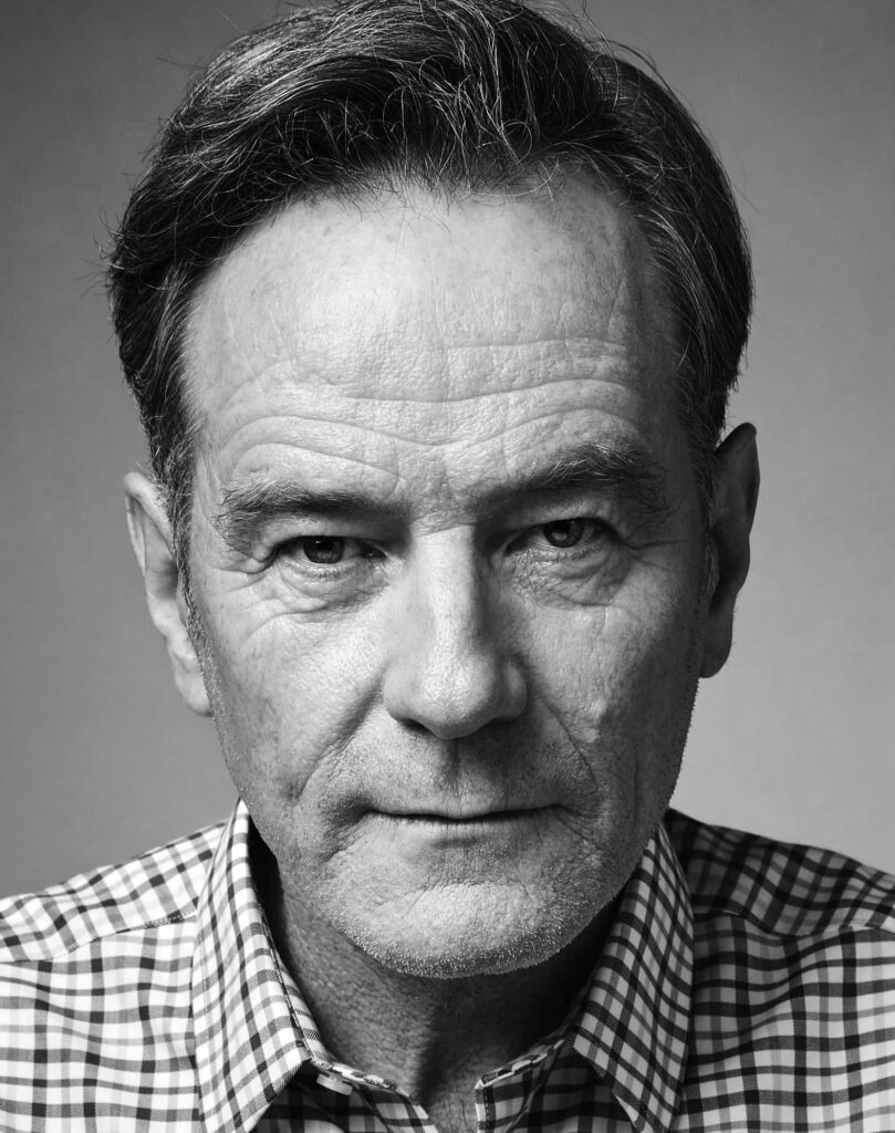 Bryan Cranston black and white portrait with intense expression and detailed high-resolution texture Wallpaper