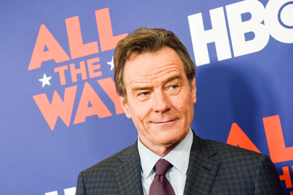 Bryan Cranston in sharp suit HBO All the Way vibrant blue red promotional wallpaper background