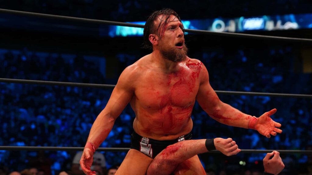 Bryan Danielson intense wrestling moment vibrant blue red lighting athleticism emotion wallpaper