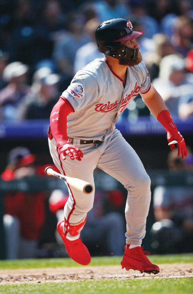 Bryce Harper in Washington Nationals uniform sprinting from home plate dynamic baseball action wallpaper