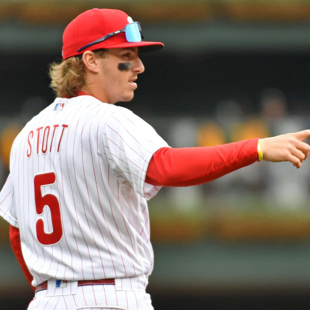 Bryson Stott MLB wallpaper in white red pinstripe uniform number 5 pointing on field action
