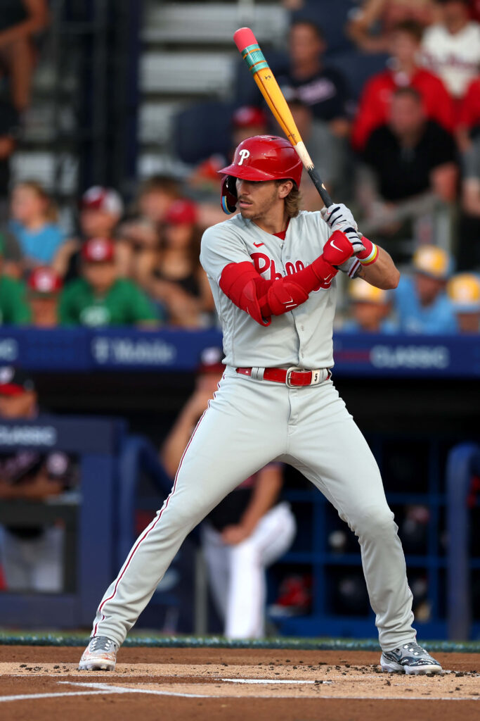 Bryson Stott at bat in gray Phillies uniform showing focus and action in stadium wallpaper