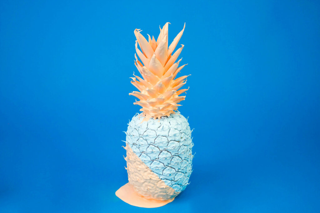 Bubblegum Dreams: Minimalist Pineapple Art in Baby Blue, Pink and Light Beige Wallpaper