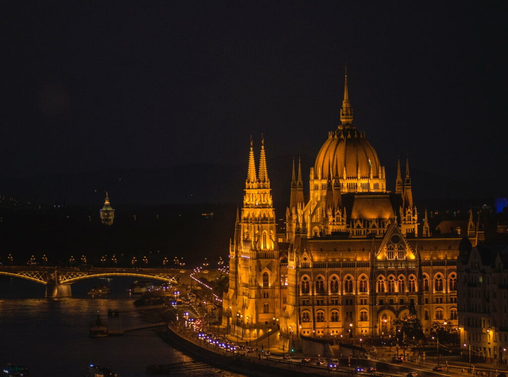 Budapest: Captivating Nighttime Aura of a Golden Cityscape Wallpaper