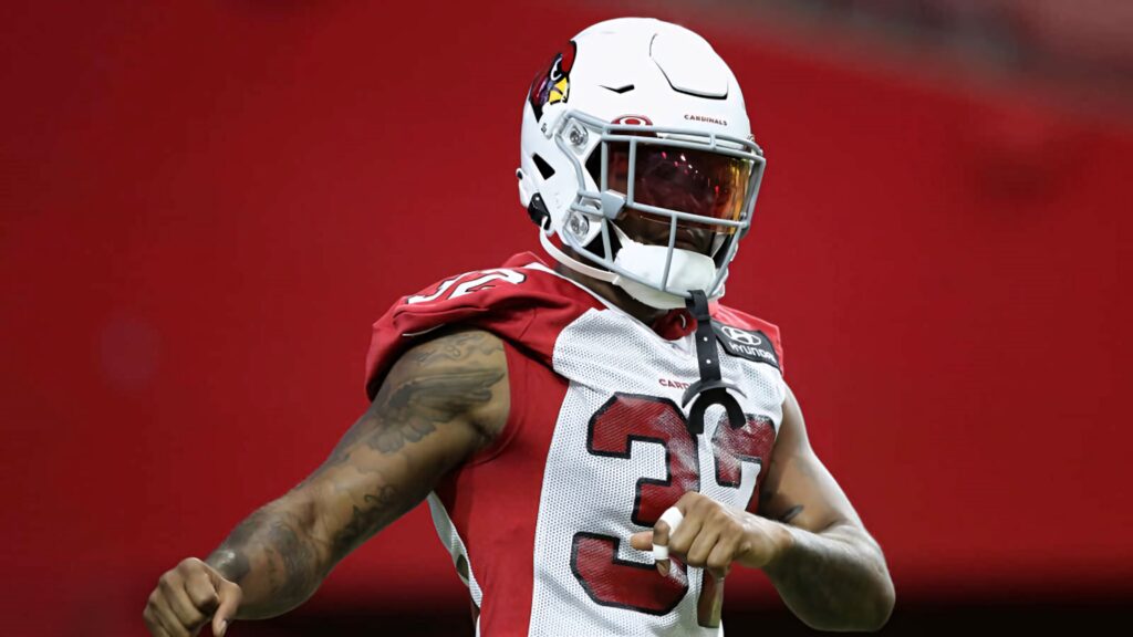 Budda Baker Arizona Cardinals number 32 intense football action pose stadium wallpaper background