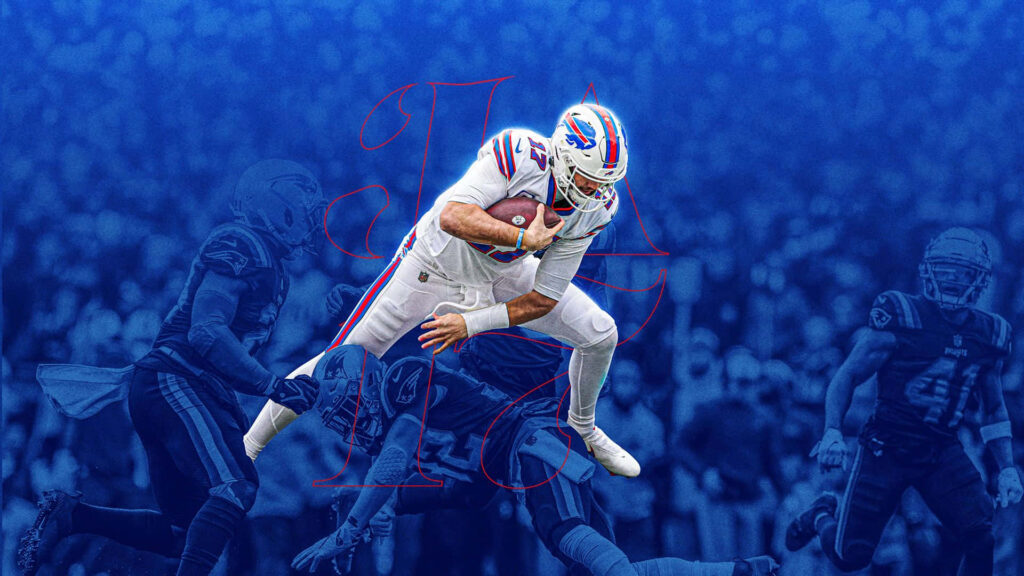 Buffalo Bills player leaping on blue gridiron mid-air evading defenders football action wallpaper