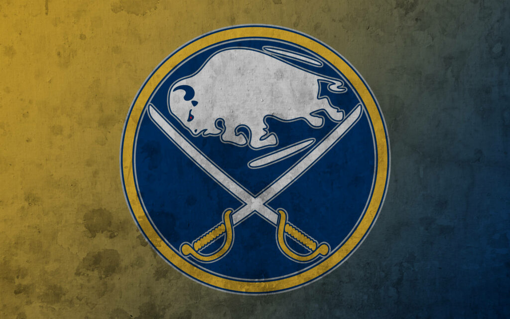 Buffalo Sabres logo on rugged blue yellow background showcasing hockey team pride energy Wallpaper
