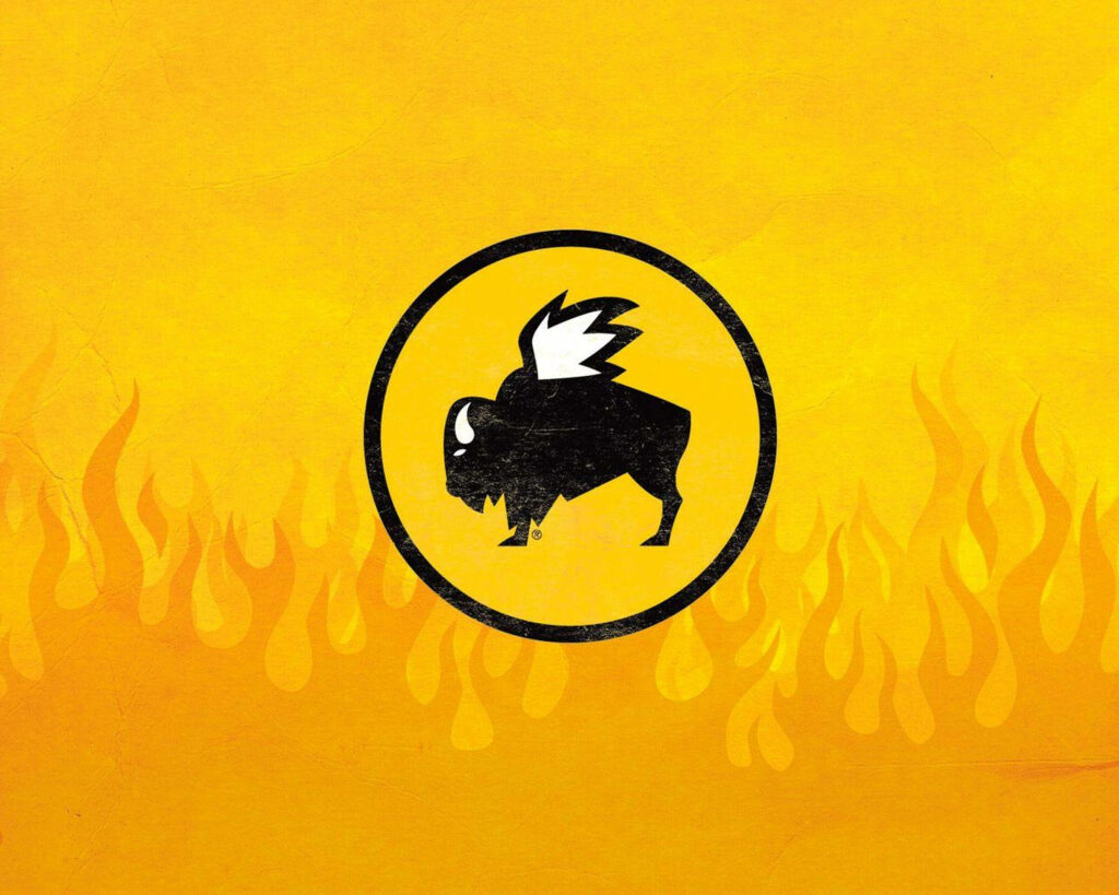 Buffalo Wild Wings logo with black buffalo and fiery orange flames on bright yellow wallpaper background