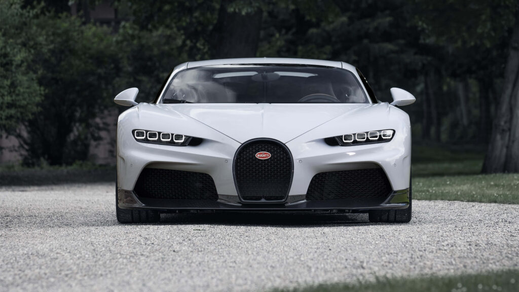 Bugatti Chiron luxury sports car sleek design front grille high speed wallpaper background