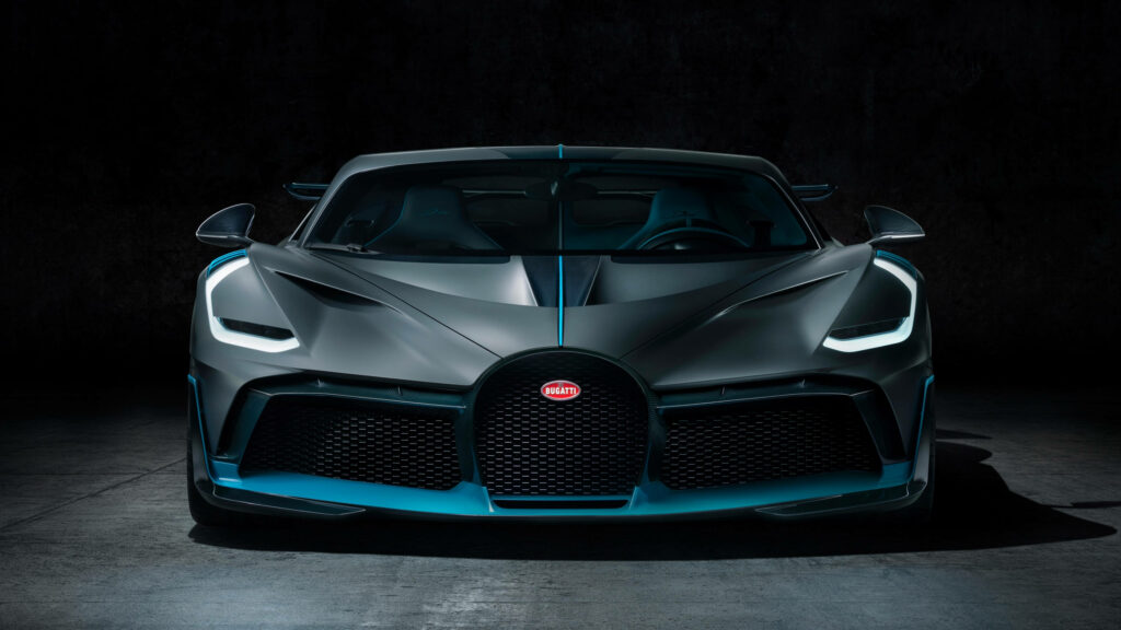 Bugatti Divo front view showcasing aggressive design and aerodynamic details on dark background Wallpaper