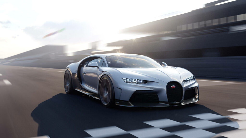 Sleek Bugatti sports car racing fast on track luxury motorsports dynamic wallpaper background