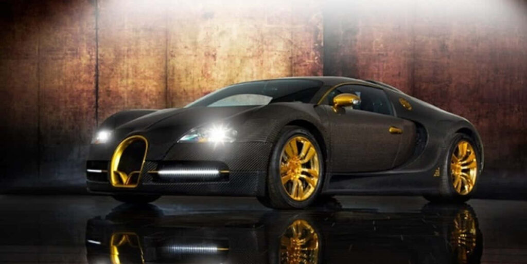 Bugatti Veyron luxury car with gold accents gleaming under dramatic lighting textured background Wallpaper