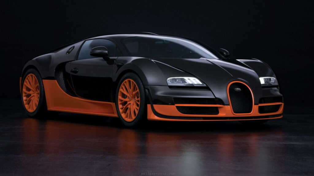 Bugatti Veyron supercar wallpaper black and orange two-tone luxury aerodynamic design background