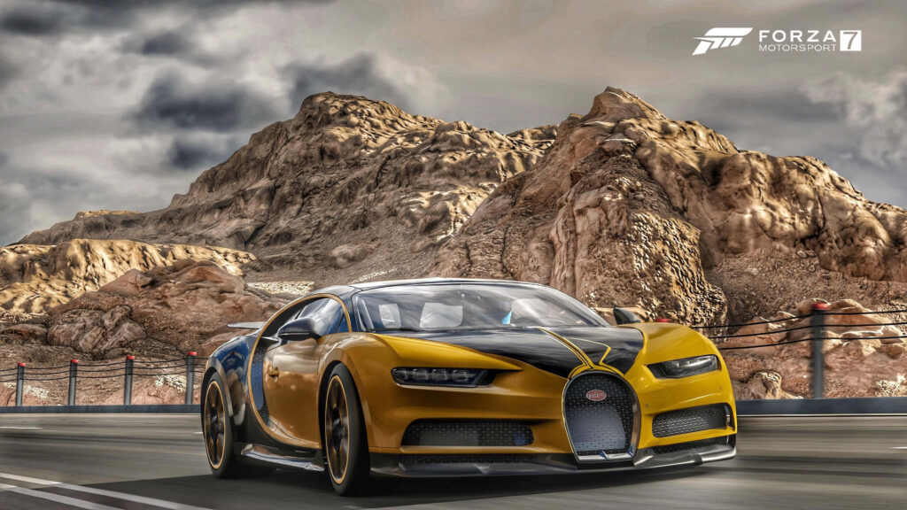 Yellow and black Bugatti speeds on mountain road under dramatic clouds Forza Motorsport 7 wallpaper