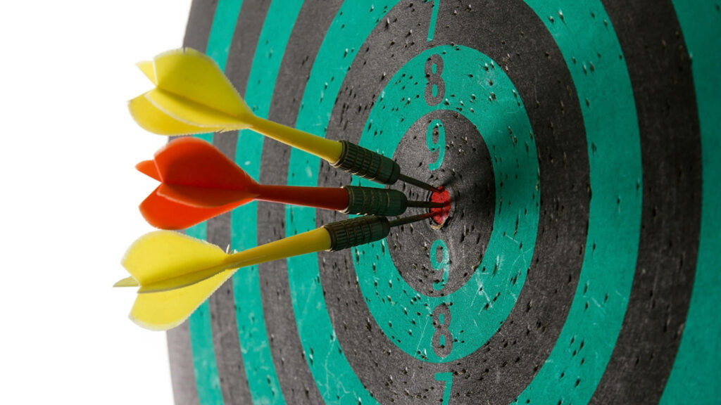 Sharpshooter's Retrospect: An Overused Close Up of Shooting Target Board Wallpaper