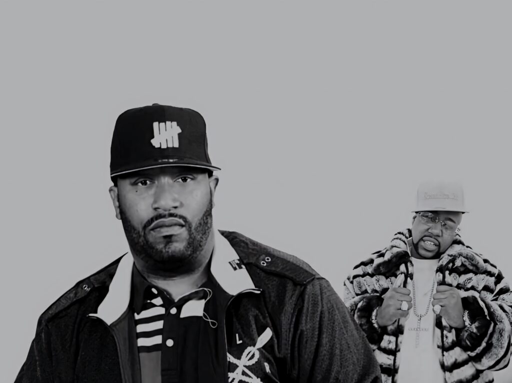Bun B rapper in urban monochrome wallpaper wearing hat and jacket with fur coat figure background