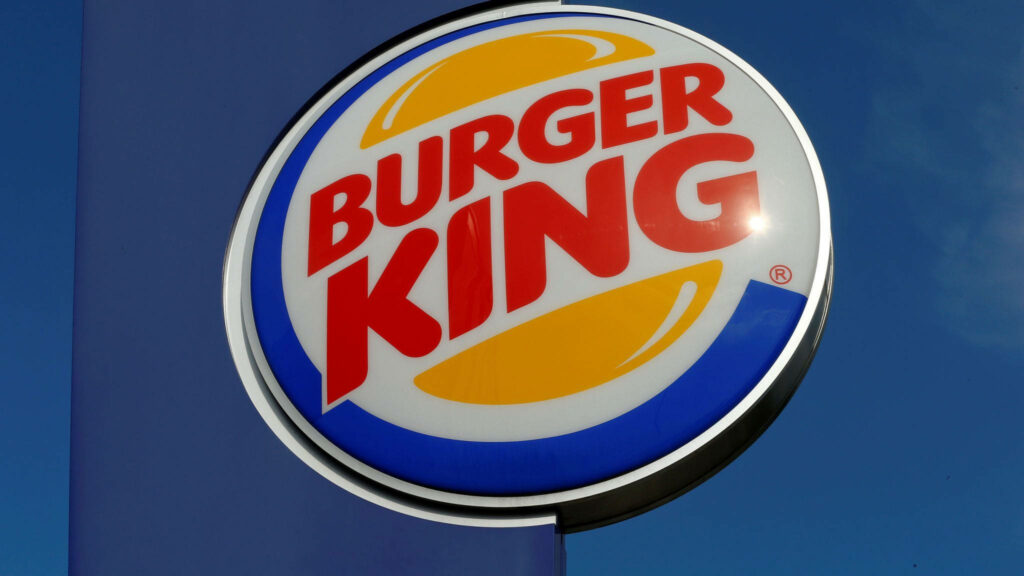 Glossy Burger King logo on vibrant blue background with bold red and yellow branding wallpaper
