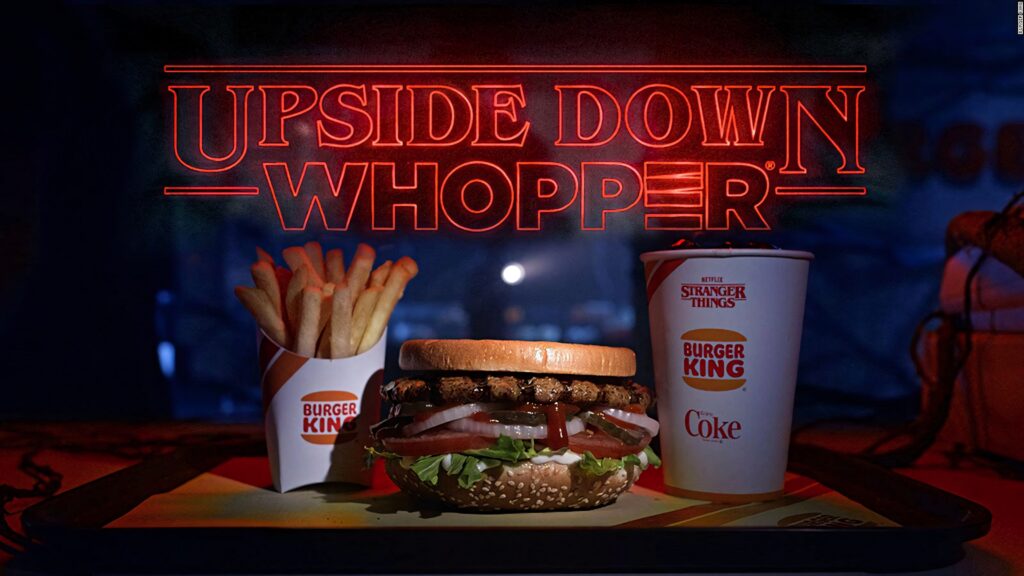 Burger King Upside Down Whopper meal with fries drink neon Stranger Things retro wallpaper background