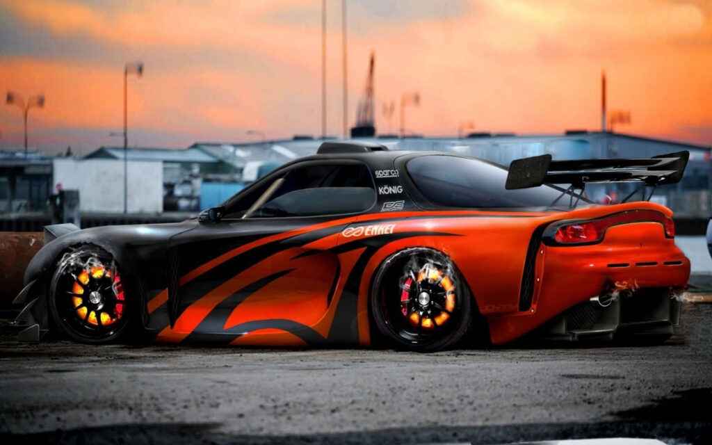 Blazing Beauty: The Mazda Rx 7 Ignites the Sunset Sky Wallpaper