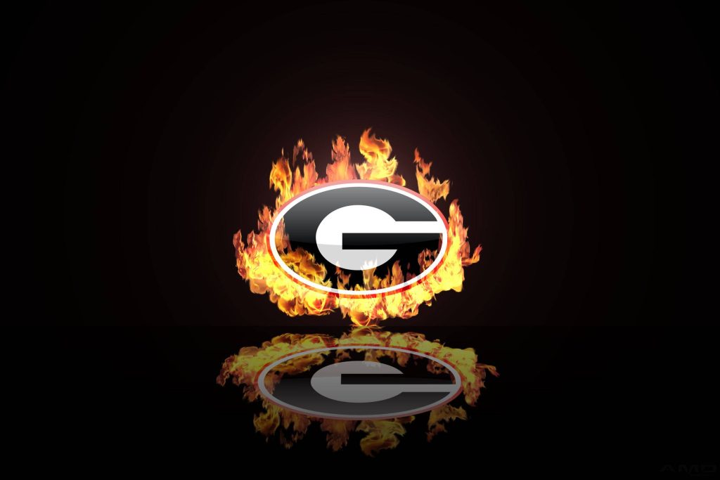 Burning Georgia Bulldogs G logo with vivid flames and reflection on black background wallpaper