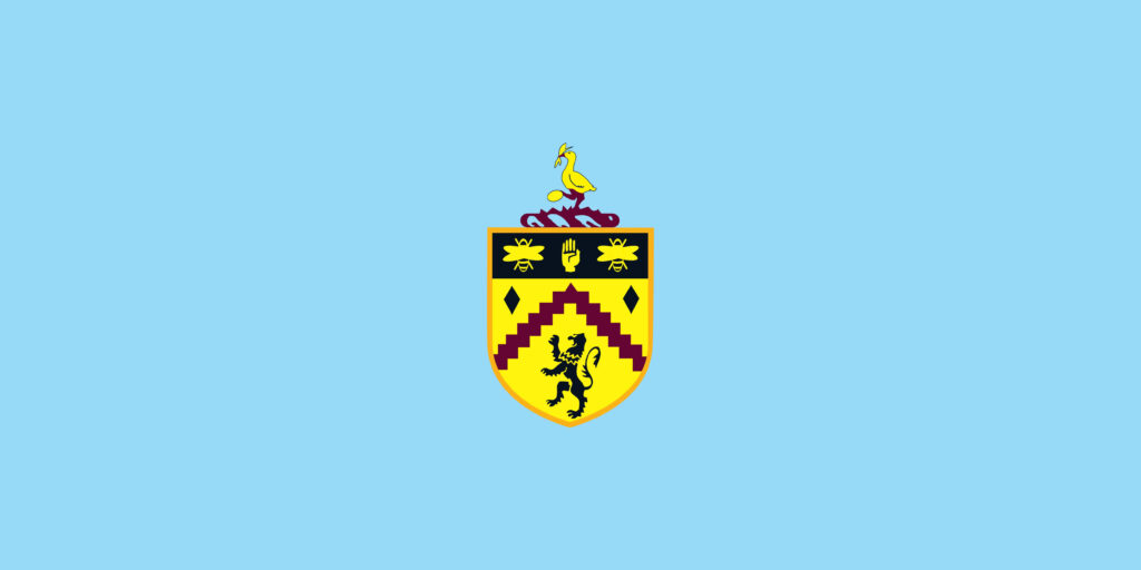 Burnley FC wallpaper with iconic crest yellow shield on light blue minimalist football background
