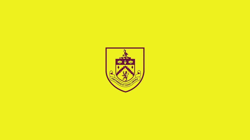 Burnley FC wallpaper with club crest on vibrant yellow background minimalist modern design