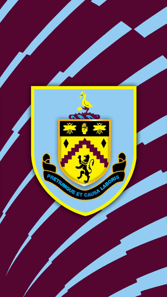 Burnley FC wallpaper with iconic crest and bold maroon sky blue diagonal stripes background