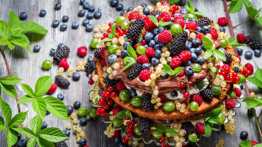 Spring Delights: A Bountiful Array of Gorgeous Desserts, Embracing the Vibrant Palette of Fruits, Nestled Amidst Nature's Splendor Wallpaper
