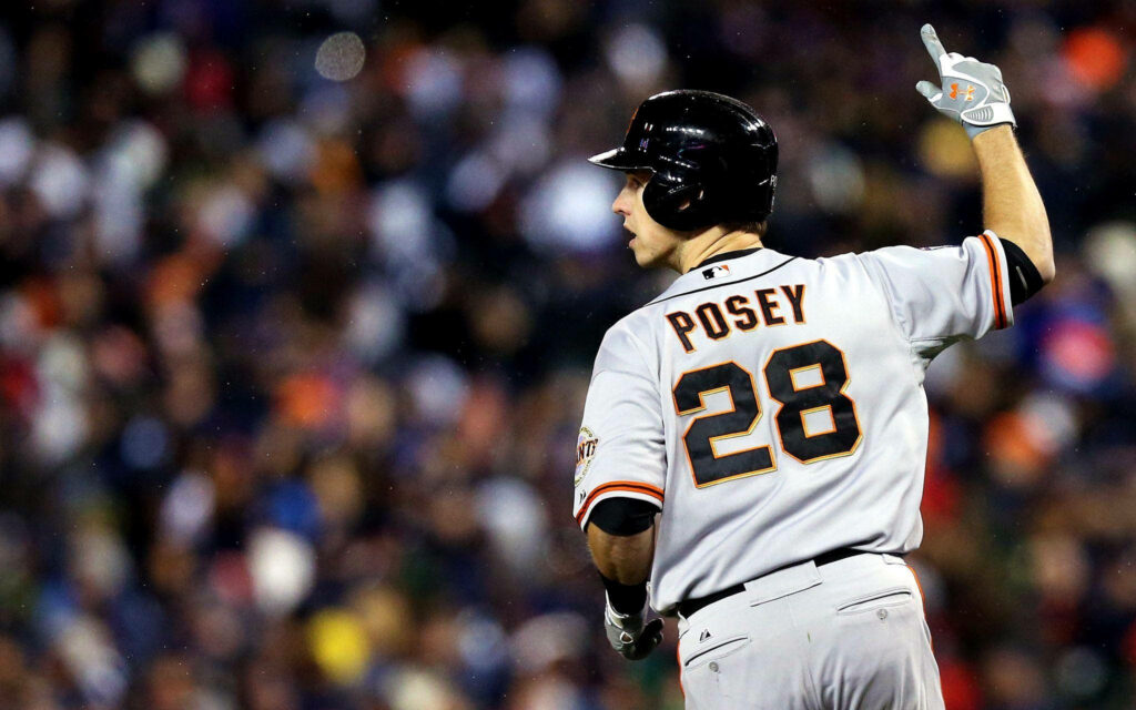 Buster Posey #28 San Francisco Giants mid-action vibrant stadium crowd baseball wallpaper