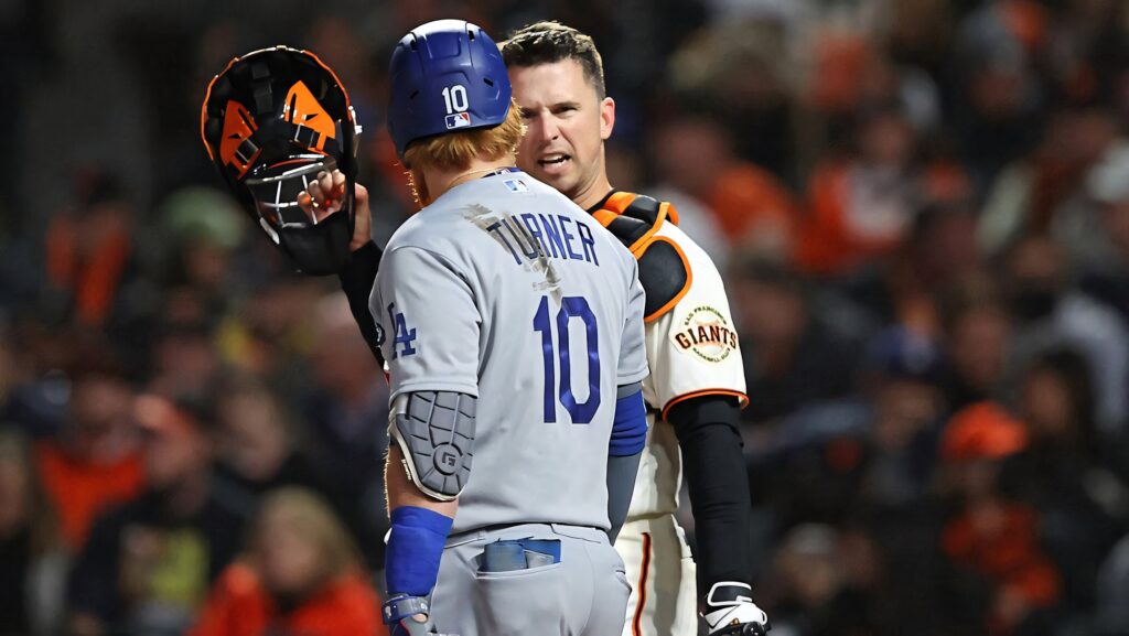 Buster Posey San Francisco Giants face off with LA Dodgers player intense stadium rivalry moment Wallpaper