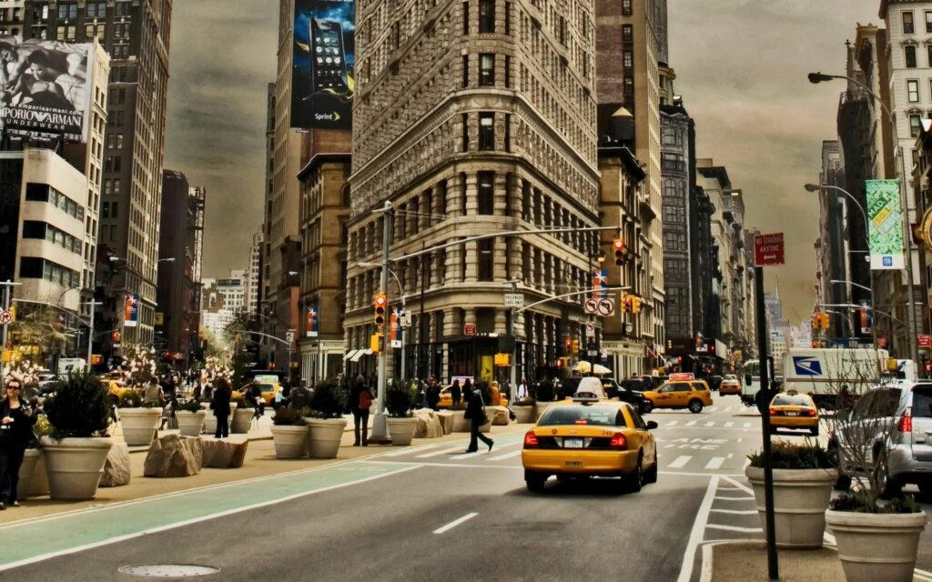 Vibrant NYC Street Wallpaper: Taxis, Icons & Urban Life