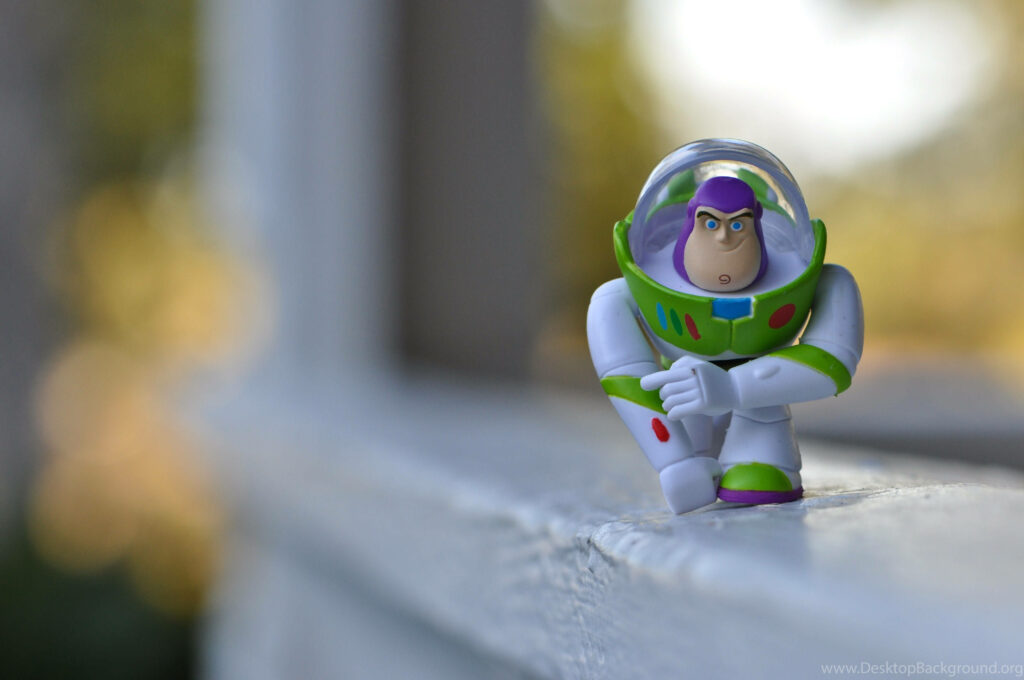 Buzz Lightyear Toy Story wallpaper hero pose white green suit vibrant colors background blur