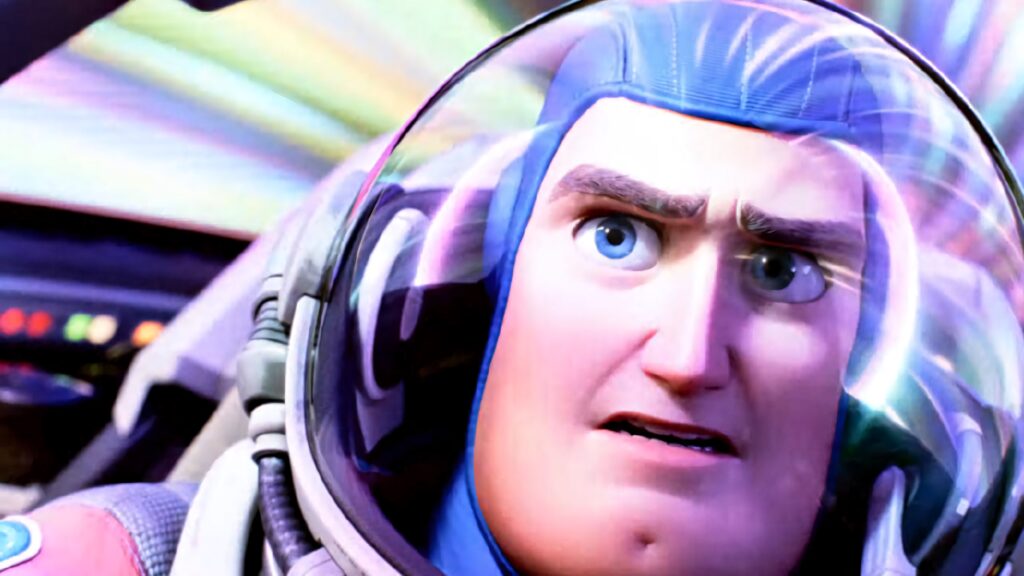 Buzz Lightyear amazed with colorful light streaks swirling behind for high-speed adventure wallpaper