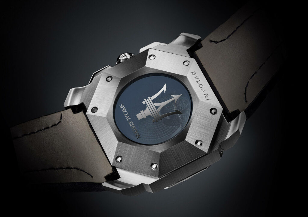 Bvlgari watch case back with trident emblem leather strap stainless steel dark background wallpaper